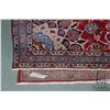 Image 2 : 100% handmade Iranian wool carpet "Mashad" with center medallion, red background and overall floral 