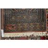 Image 2 : Wool scatter rug with center medallion, putty coloured background and highlights of black, cream and