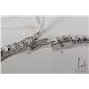 Image 2 : Sterling silver with white gold overlay 5.6 carat moissanite tennis bracelet, size 5 1/2", includes 