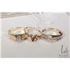 Image 1 : Three petite rings including 14kt yellow gold diamond solitaire size 6.25, 10kt gold ring with two s