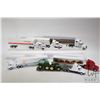 Image 1 : Six Ertl 1/64 scale semi trucks including McDonald's, Case IH, CAT, Co-Op, Massey Ferguson and John 