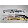 Image 1 : Six 1/64 Ertl diecast semi trucks including CAT, Agco, New Holland, Hesston, Home Depot and Co-Op. P