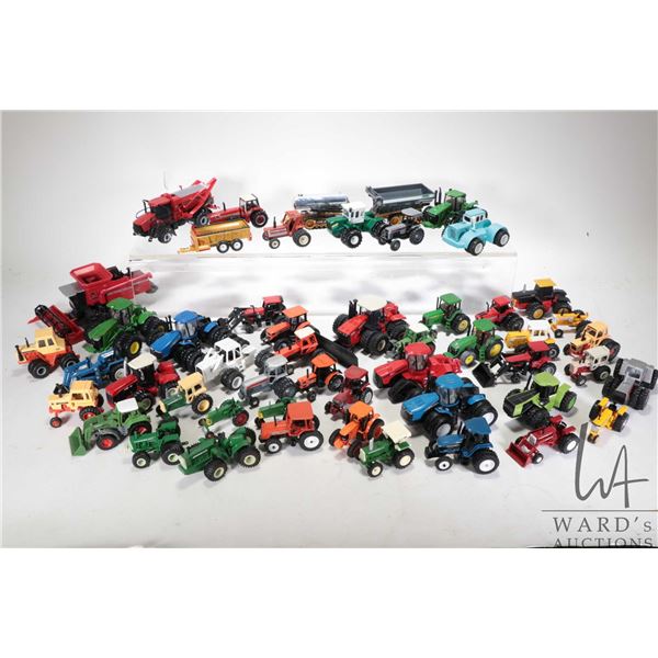 Selection of diecast 1/64 scale Ertl and Toy Farmer farm tractors, equipment and vehicles. Assorted 