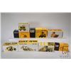 Image 1 : Eight 1/50 scale CAT diecast toys including Log skidder, track loader, backhoe, track type excavator