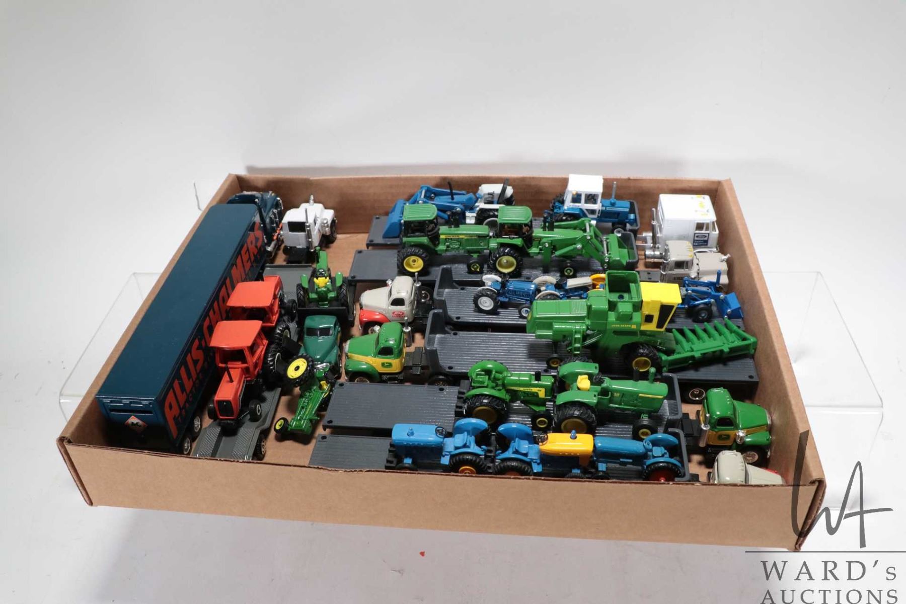 Ertl Collection Eight 1/64 scale Ertl diecast truck and trailers including Ford, John ...