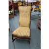 Image 1 : Antique nursing rocker with striped button tufted upholstery and carved decorative back