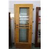 Image 1 : Pair of vintage heavy maple exterior door set with security glass and brass hardware, 82" X 30"