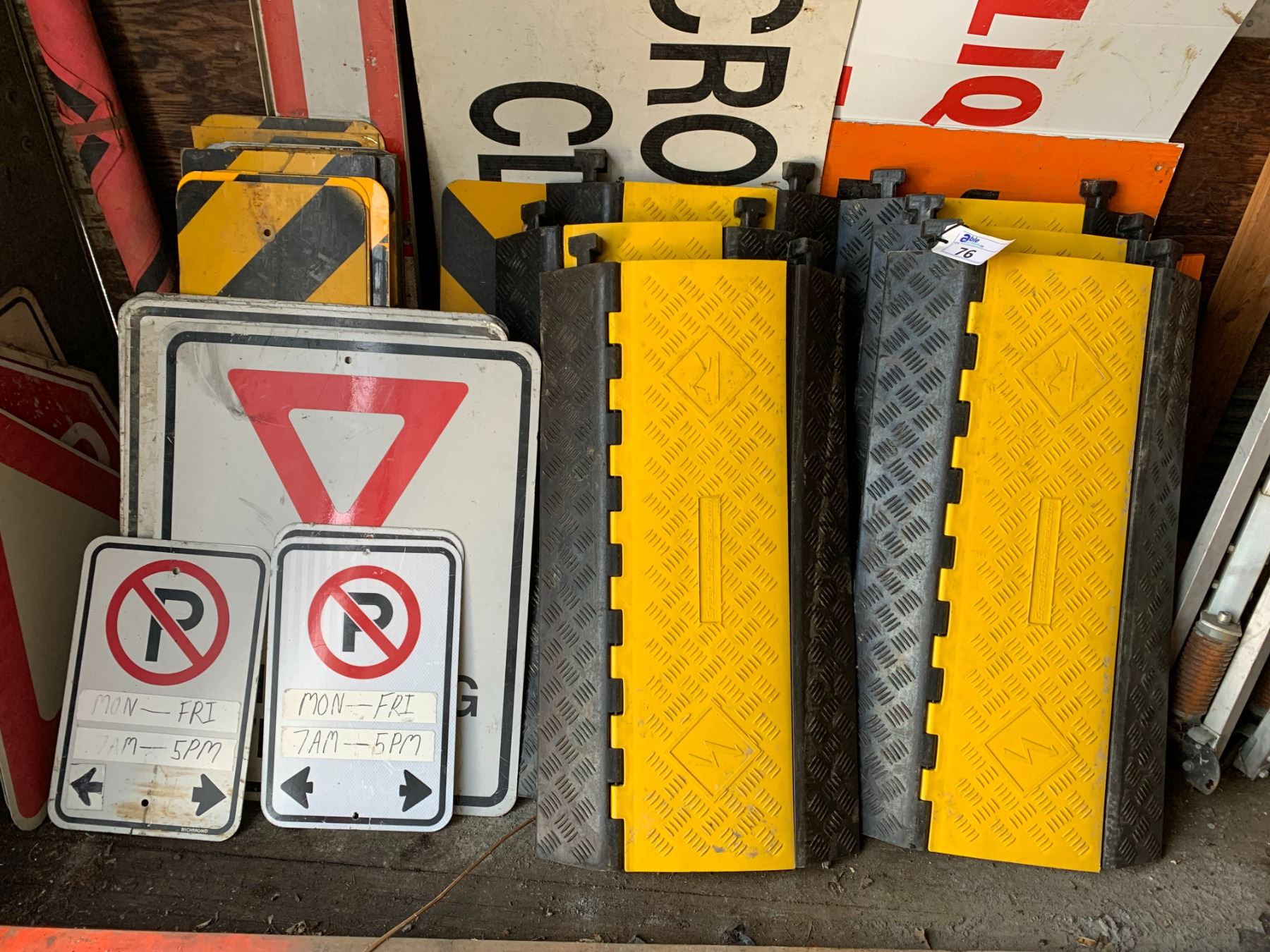 GROUP OF 6 HOSE/WIRE LINE ROAD PROTECTORS