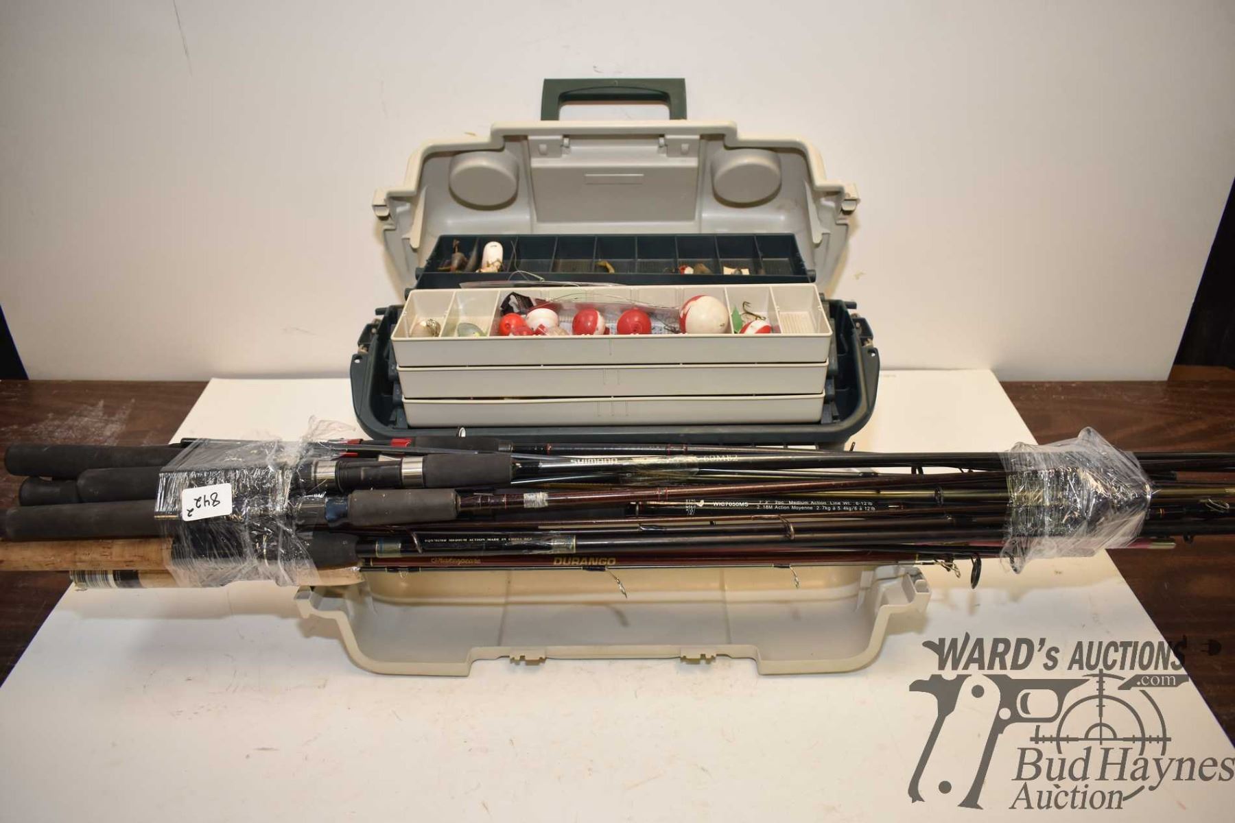 12 spinning reel fishing rods and tackle box w/ assorted tackle and 7 ...