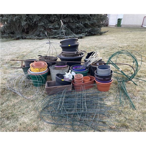 Assorted Outside Gardening Containers With Multiple Metal Plant Climbing Assists