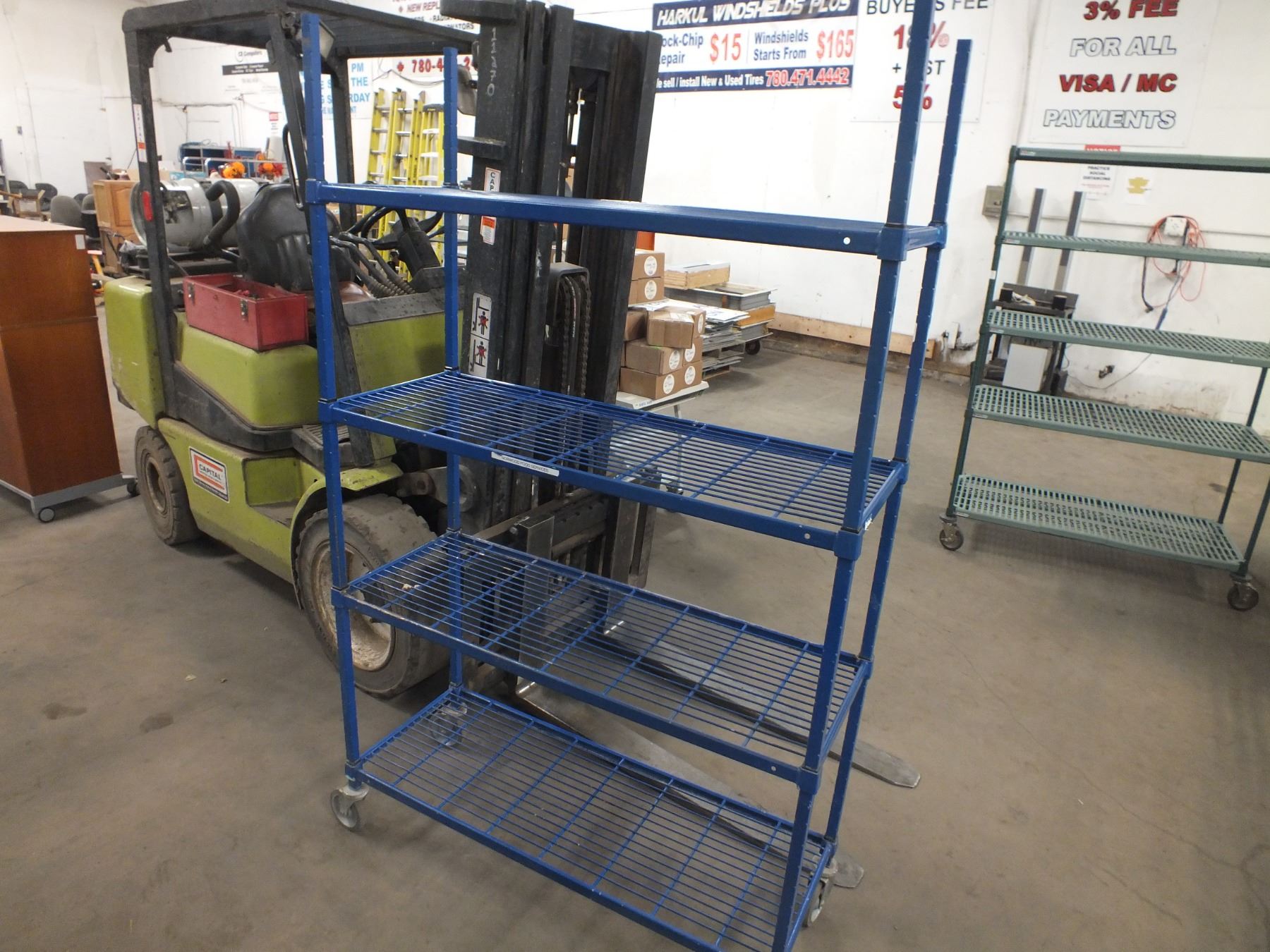 Blue Metal Rack On Wheels