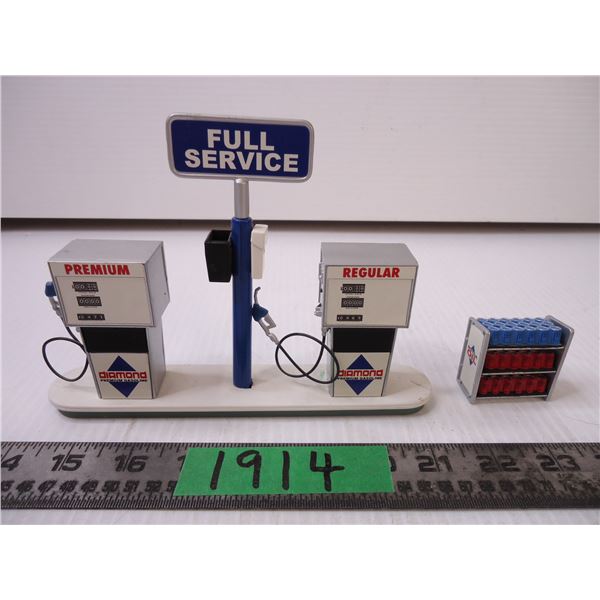 (2) Pieces of Gas Station Accessories-Pumps and Oil Can Displayer