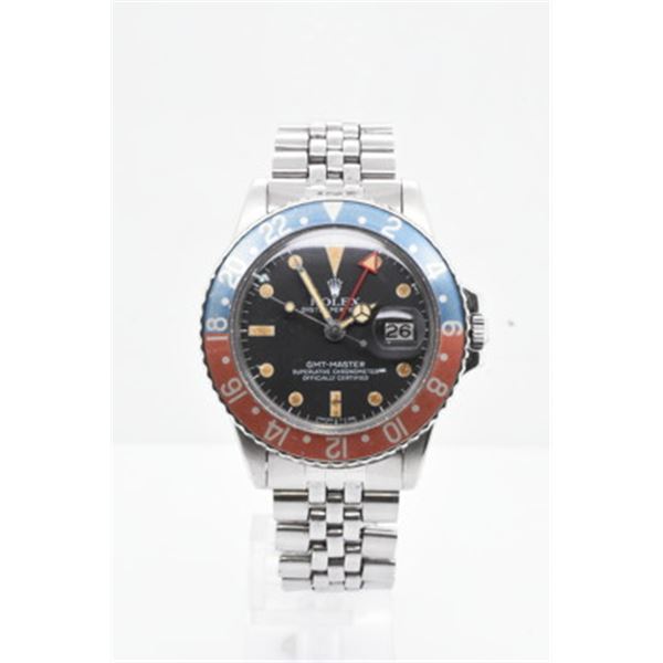 Pre-owned ROLEX GMT Model #1675 S/S 40MM