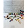 Image 1 : Assorted Toy Story, Furbies, and other Character Toy Figurines