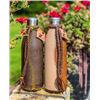 Image 1 : His and hers leather covered thermal water bottles