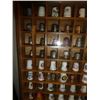 Image 2 : Wooden display case with thimbles