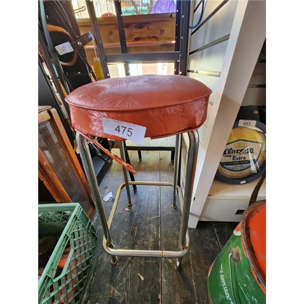 Patterned Red Stool Red bar stool with floral pattern seat