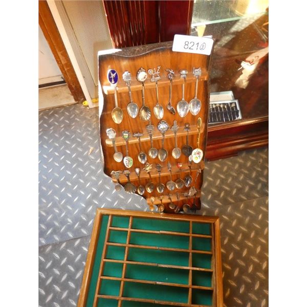 Collection of spoons, display case