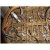 Image 2 : Collection of stirrups in wicker basket