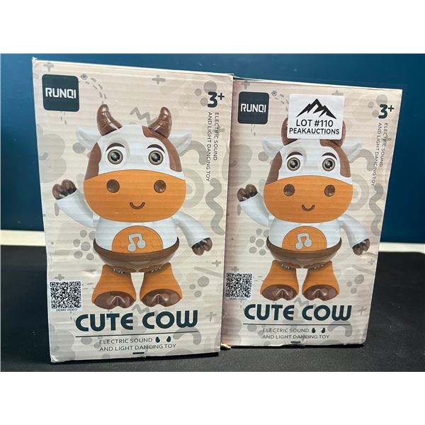 Lot of 2 Dancing/Light-Up Cow Toys