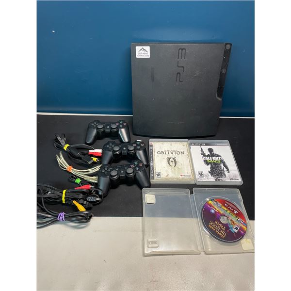 Lot of 1 Playstation 3 Console w/ 3 Controllers, Cords, and 3 Games - Used