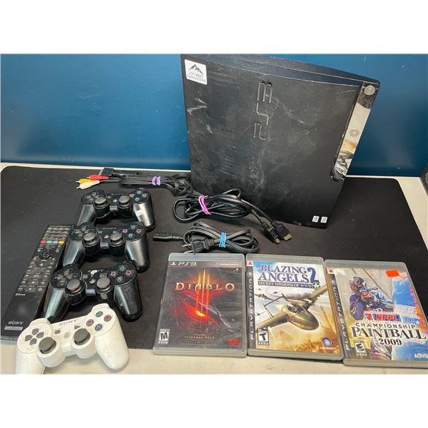 Lot of 1 Playstation 3 Console w/ 4 Controllers, Cords, Remote and 3 Games - Used