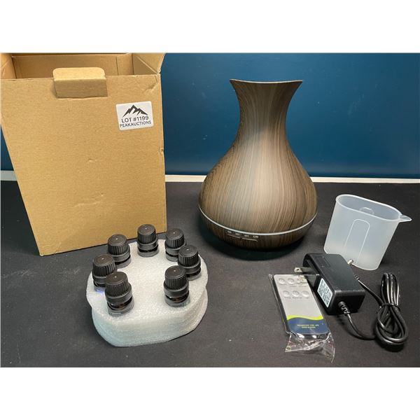 Lot of 1 Aroma Diffuser/Home Humidifier w/ 7 Assorted Essential Oils/Scents