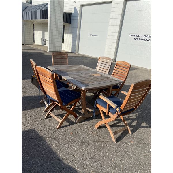 Sun country patio tale with 2 jacknife leafs and 6 chairs teak