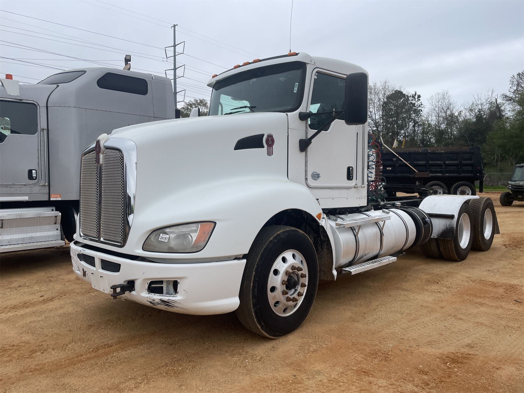 2014 KENWORTH T660 Day Cab Truck J.M. Wood Auction Company, Inc.
