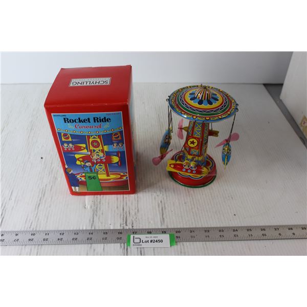 Schylling Rocket Ride Carousel Metal Wind Up Toy - Bodnarus Auctioneering