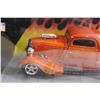 Image 2 : ERTL Collectibles AmericanMuscle Street Rods 1940 '34 Ford High Tech Die Cast - 1/18