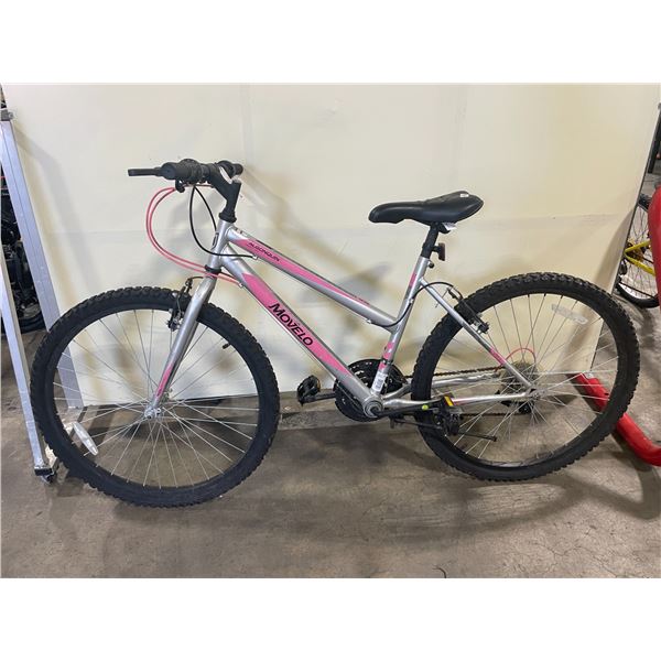 2 BIKES: NORCO YELLOW 18 SPEED FRONT SUSPENSION MOUNTAIN BIKE, & MOVELO GREY 18 SPEED MOUNTAIN BIKE