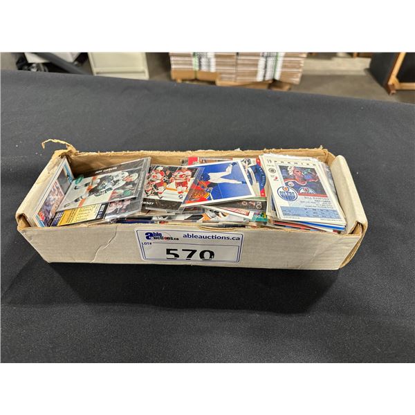 BOX OF ASSORTED COLLECTIBLE HOCKEY CARDS & 3 ASSORTED BLUE RAY DISCS