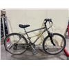 Image 2 : 2 BIKES: RALEIGH GREY 18 SPEED MOUNTAIN BIKE & SUPERCYCLE SC1800 PURPLE 18 SPEED MOUNTAIN