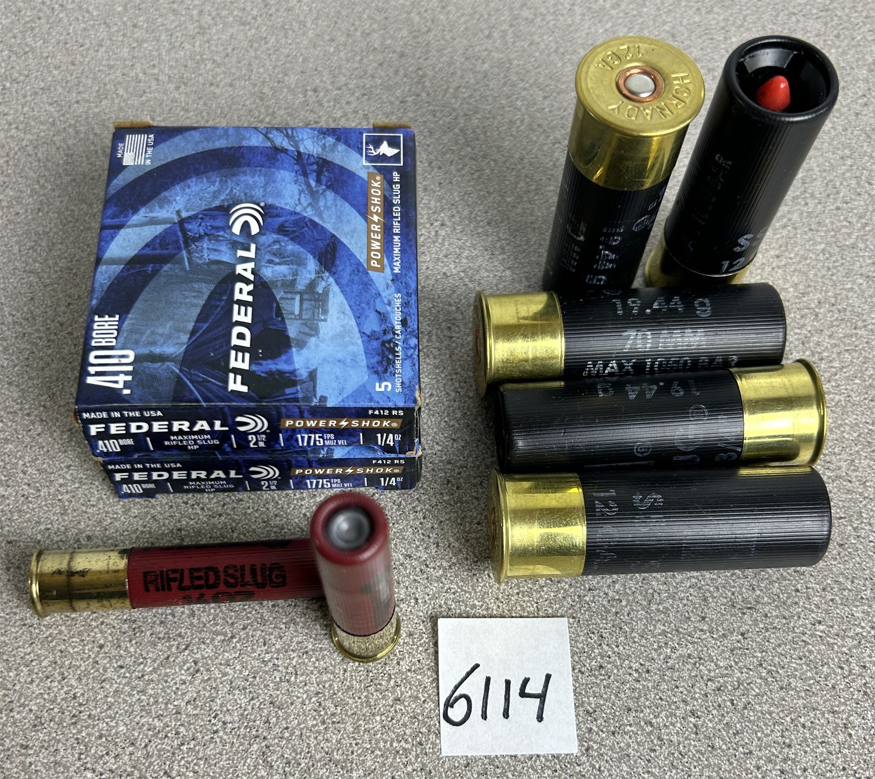 AMMO: 10 X 410 GA 2 1/2 INCH SLUG & 5 X 12 GA 2 3/4 INCH SST SLUG