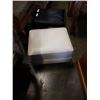 Image 1 : BLACK GLIDER FOOTSTOOL AND WHITE FOOTSTOOL