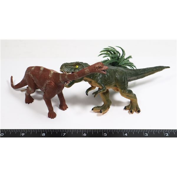 TWO TOY DINOSAURS MEDIUM SIZE WITH PALM TREE