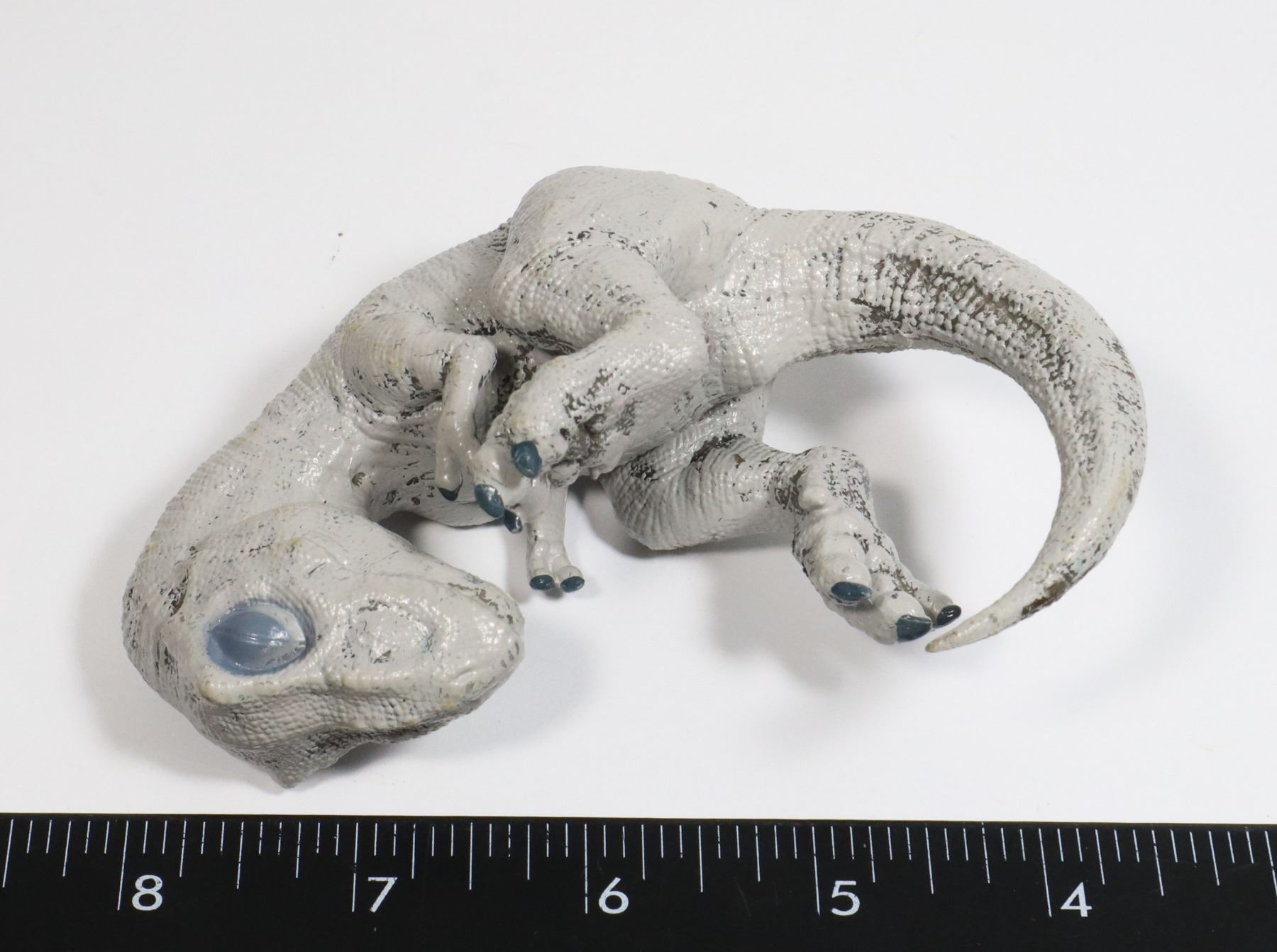 PLASTIC FOSSILIZED DINOSAUR EMBRYO-PARCIL EGG
