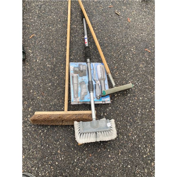 Assorted brushes and brooms