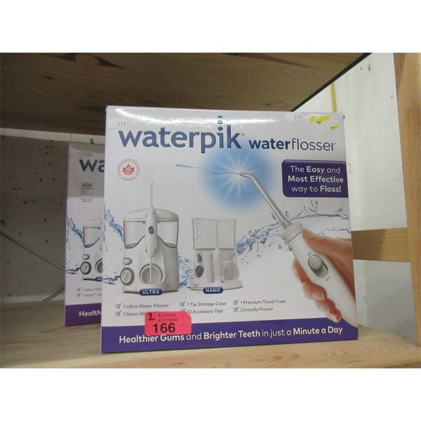 2 Waterpik Water Flosser Twin Packs - Open boxes