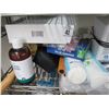 Image 2 : Body Wash, Cotton Rounds, Air Filter & Assorted Supplies on Shelf