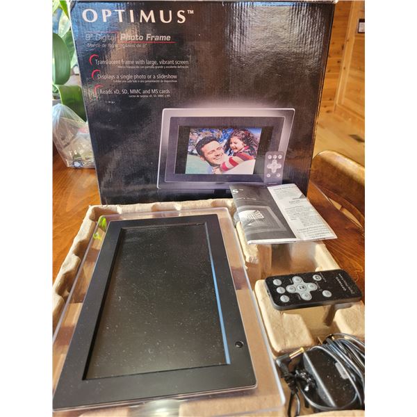 Optimus 9  digital photo frame, brand new in box. Never used - great Christmas present for senior