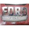Image 3 : pair of 750 ford badges