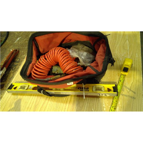 level, measuring tapes , hand drills and misc in bag
