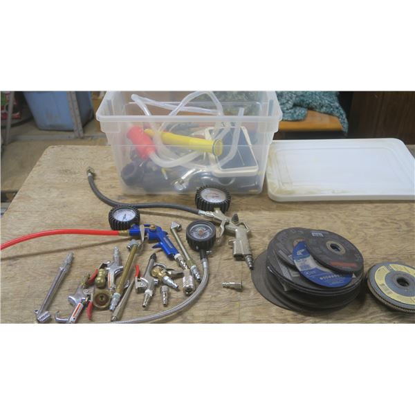 Smaller Tote Filled with: Noozles for jerry can, solar panel, hooks and brackets, assorted air hose 