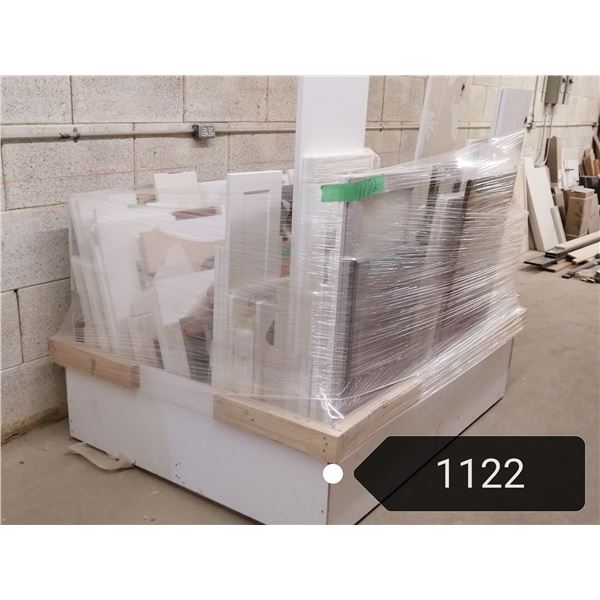 Pallet #1. Large lot of composite finished doors, including some wood & composite shelf & c`top supp