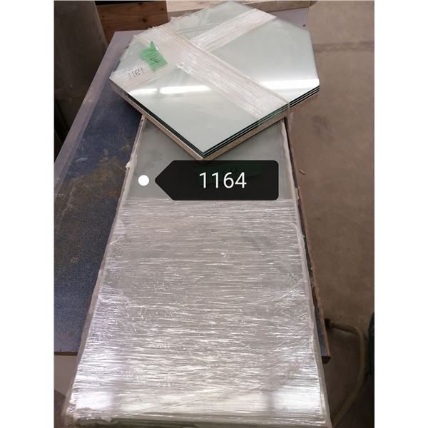 12 pieces of 3mm glass 12 X 48 (used) & 3 pieces of 5mm angled glass corner shelves(new)