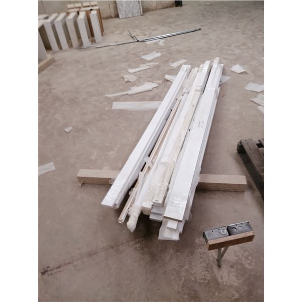 Lot of flat white stock & outside corner mouldings