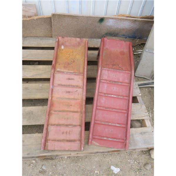 set of metal vehicle ramps