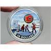 Image 2 : 2017 $10 Calgary Flames. Colourized. 99.99% pure Silver. Housed in its original RCM case & box of is